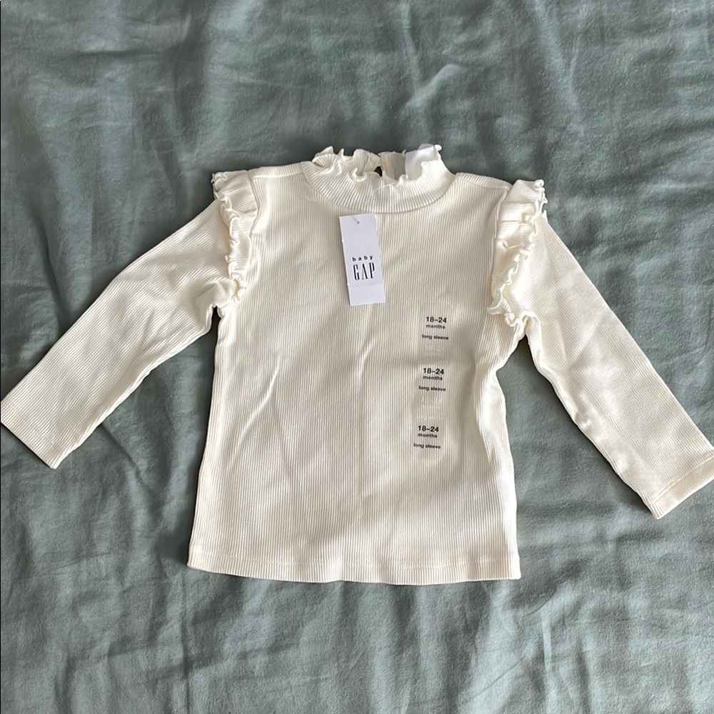 Baby Gap Girl’s Ruffle Shoulder Mock Neck Ribbed Top, 18-24M